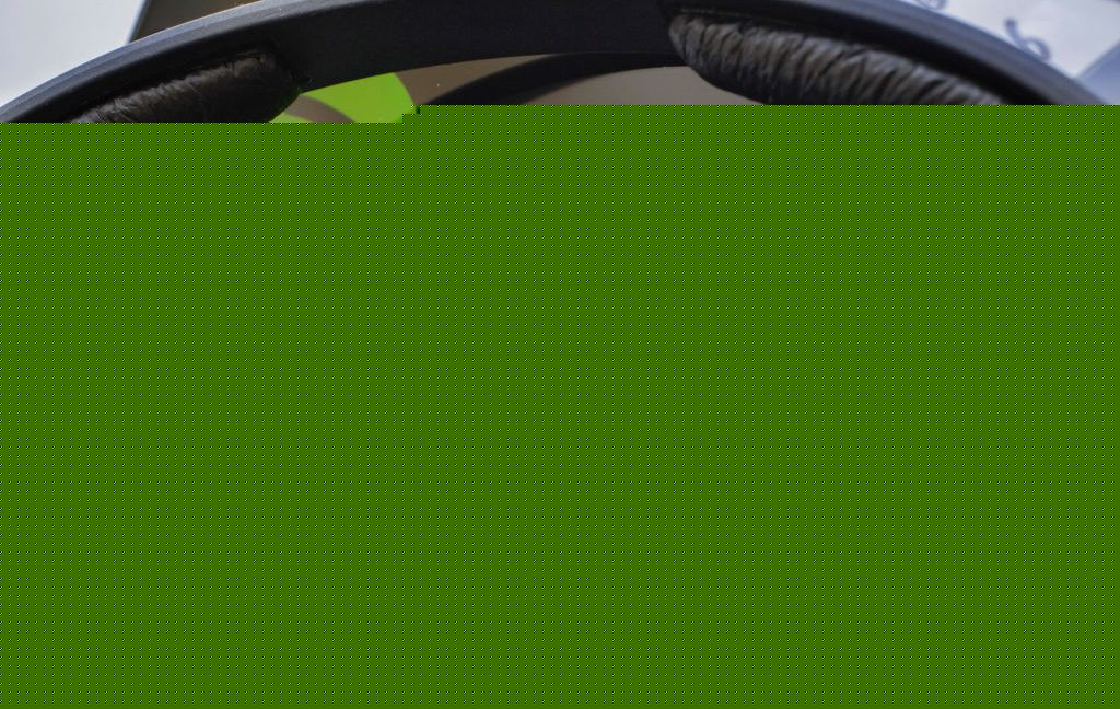 Spotify on a phone with headphones